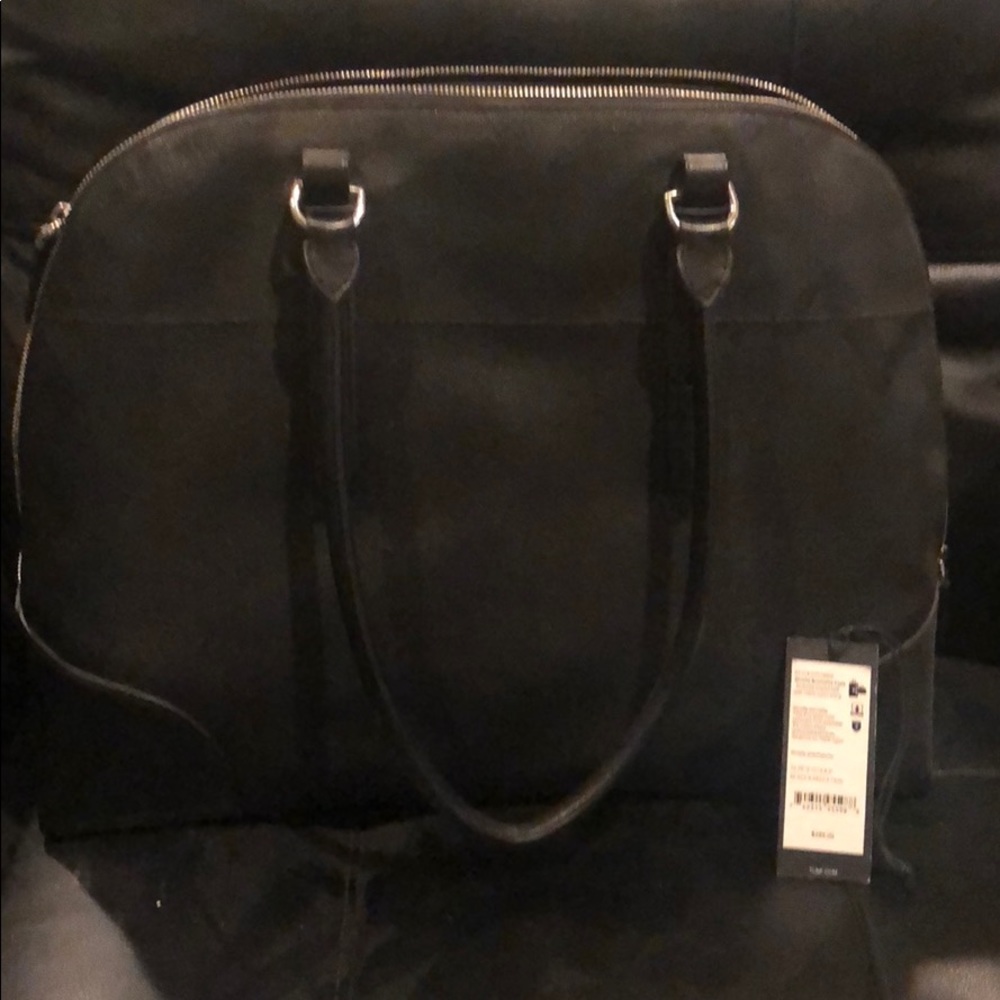 Tumi purse